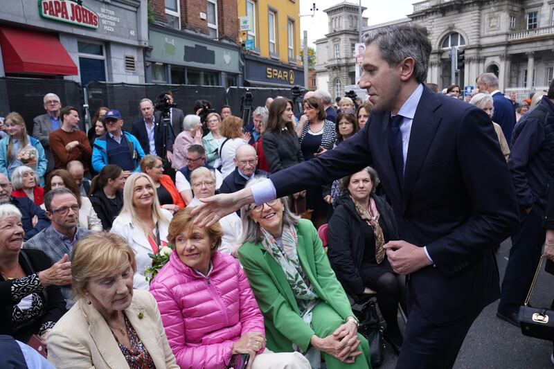 Taoiseach Simon Harris arrives for a wreath-laying ceremony