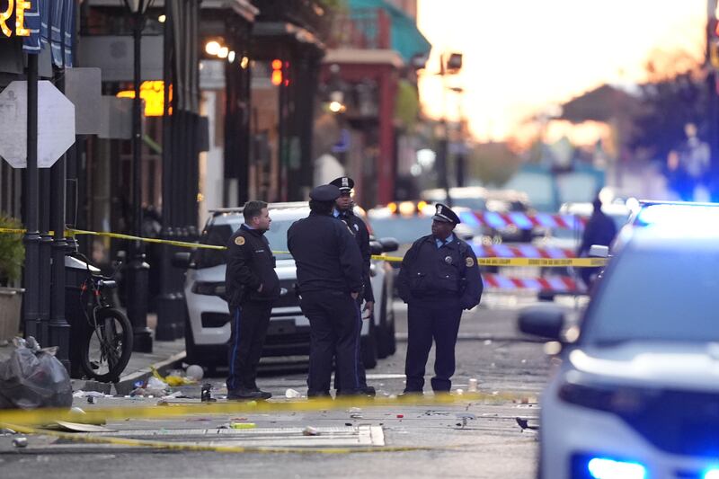 Emergency services at the scene after a vehicle drove into a crowd in New Orleans (Gerald Herbert/AP)