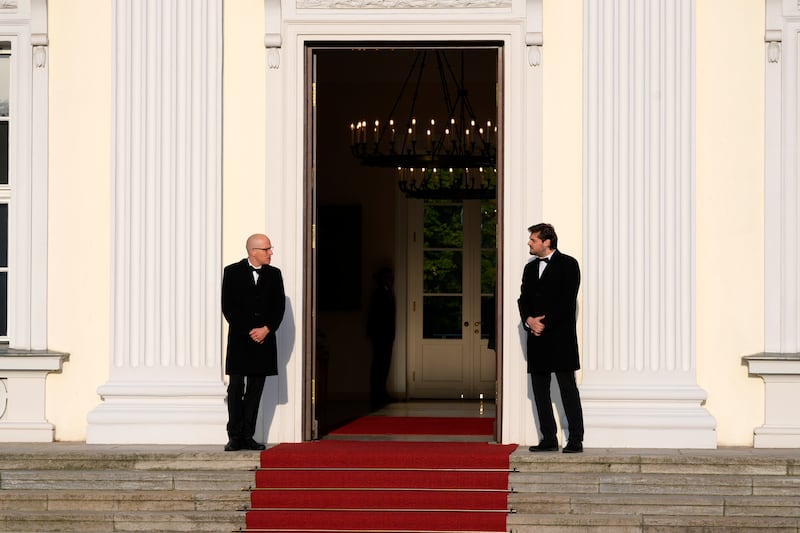 The door is open for the arrival of Mr Biden at Bellevue Palace in Berlin (Matthias Schrader/AP)