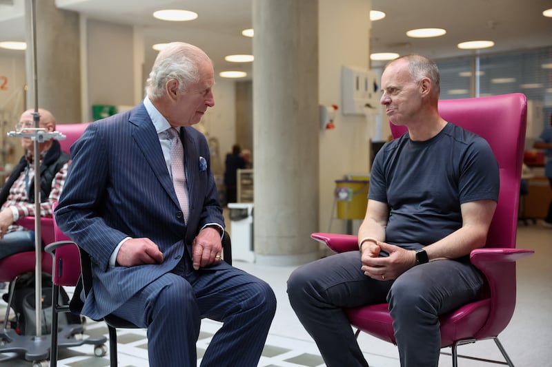 Charles, patron of Cancer Research UK and Macmillan Cancer Support, meets patient Huw Stiley during a visit to University College Hospital Macmillan Cancer Centre in London