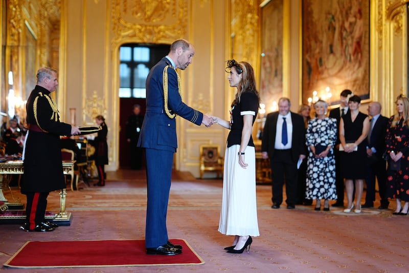 Karen Carney is honoured by the Prince of Wales at Windsor Castle