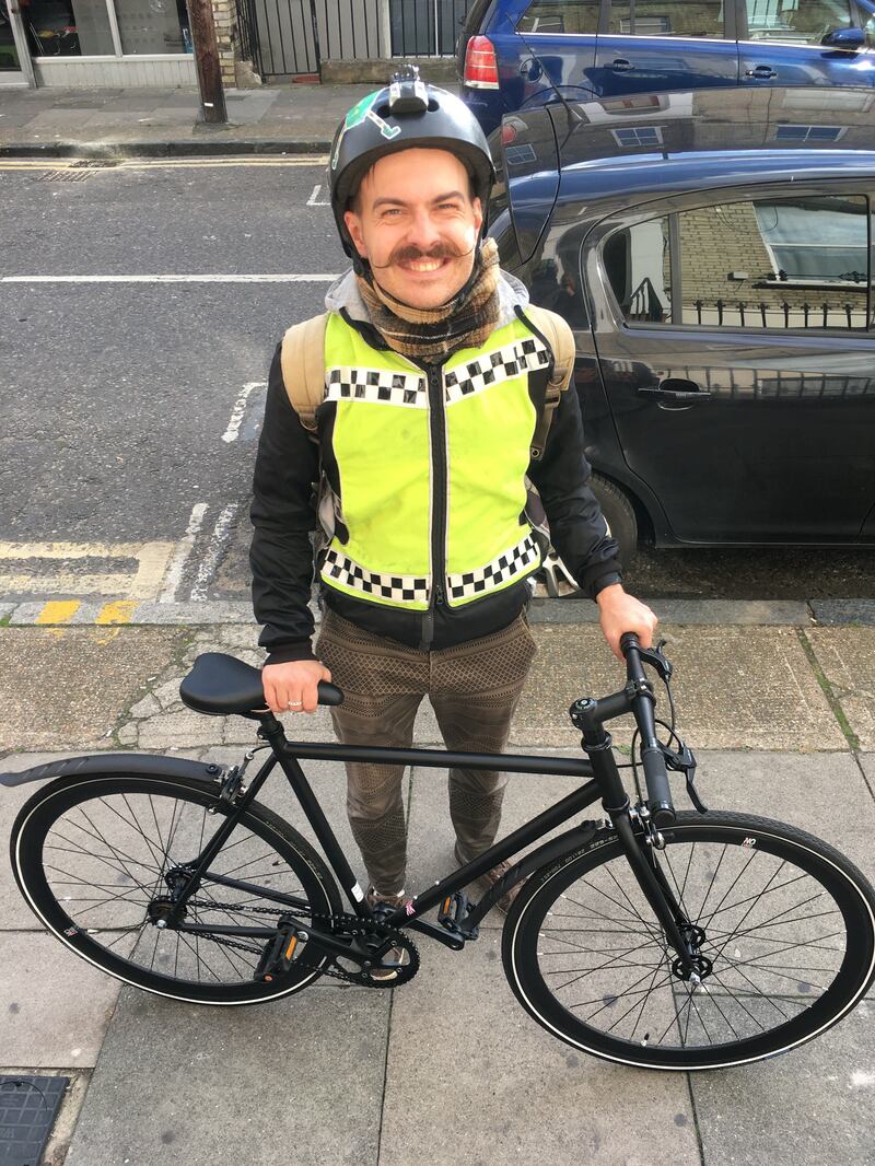 Davis Vilums with his bike on one of his routes