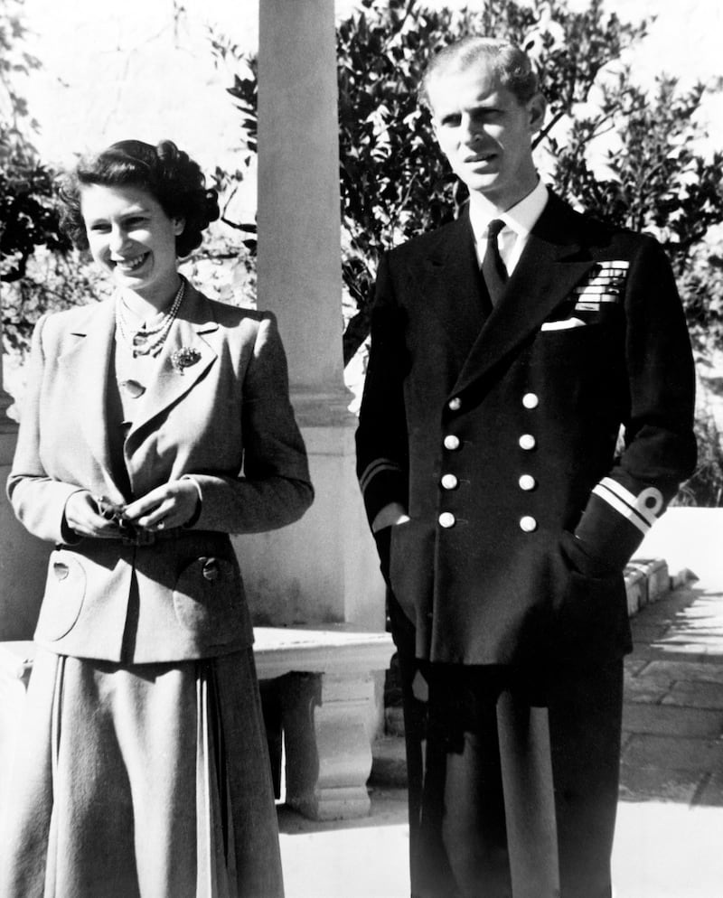 The then-Princess Elizabeth and her husband, Prince Philip, in the garden of the Villa Guardamangia in 1949