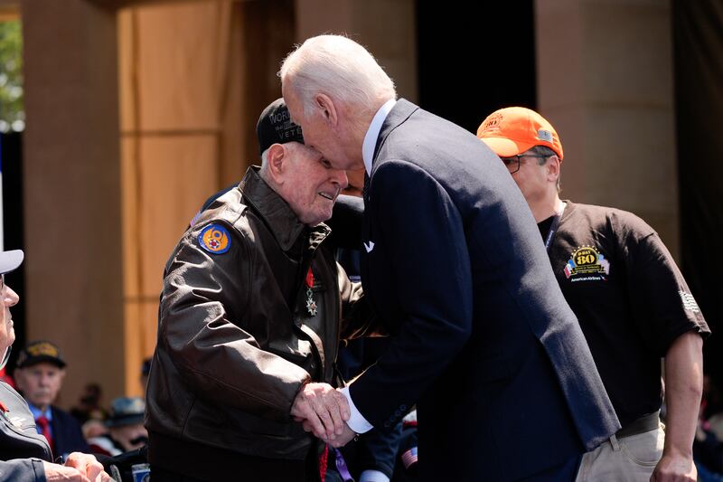 Joe Biden speaks with Second World War veteran Bob Pedigo (Evan Vucci/AP)