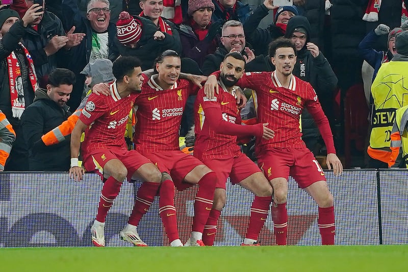 Mohamed Salah, centre right, celebrates his goal