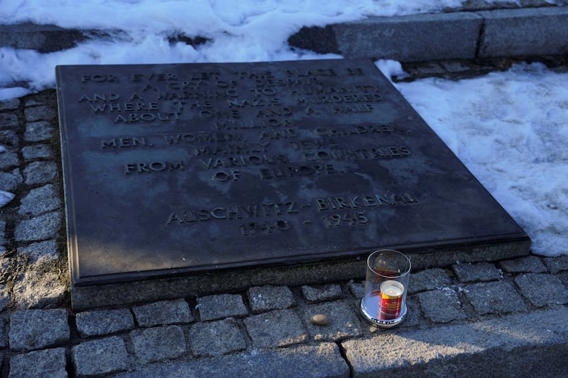 A candle and stone placed by Prime Minister Sir Keir Starmer and his wife Lady Victoria during a visit to the Memorial and Museum Auschwitz-Birkenau