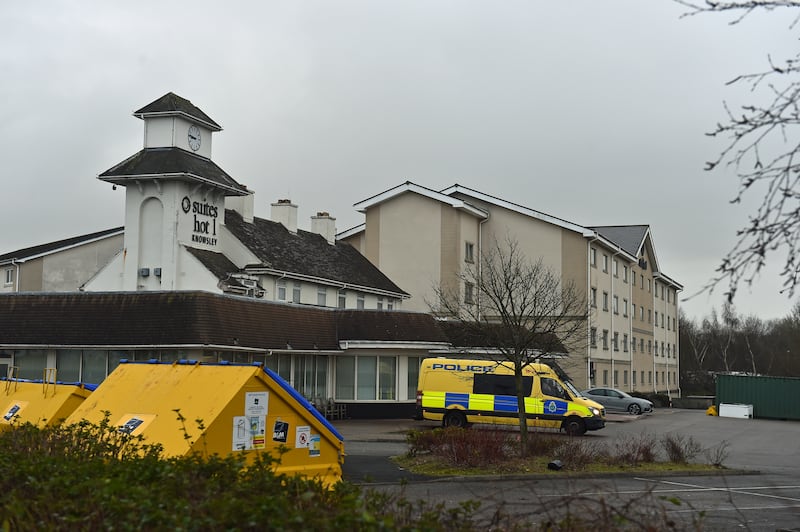 Police outside the Suites Hotel in Knowsley, Merseyside, after a demonstration against asylum seekers housed there descended into chaos