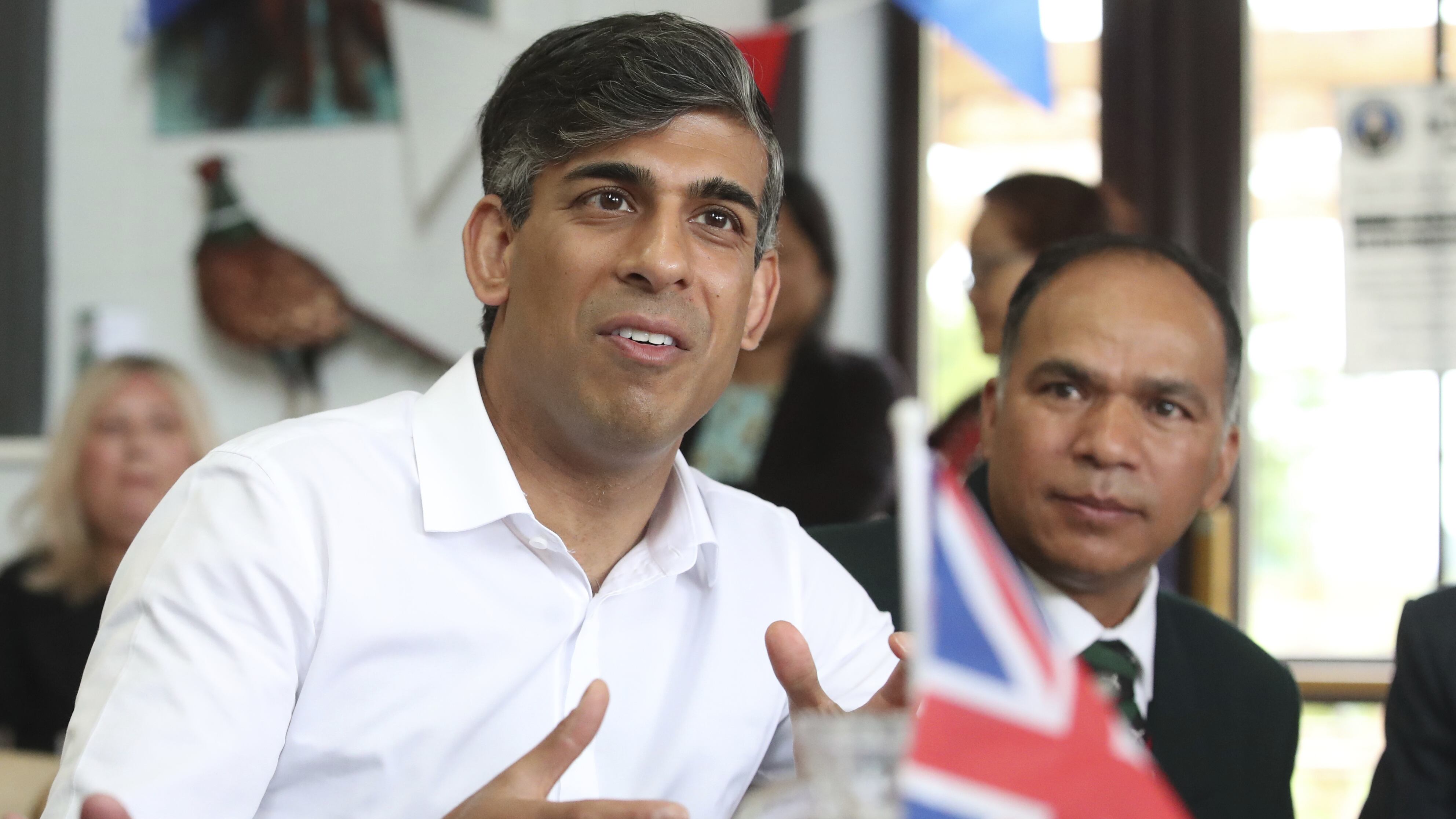 Prime Minister Rishi Sunak meets former members of the armed forces at a cafe on Armed Forces Day in his Richmond and Northallerton constituency, while on the General Election campaign trail. Picture date: Saturday June 29, 2024.