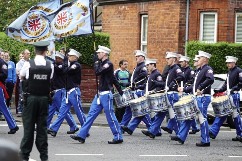 The controversial loyalist band parade off Ormeau Road to commemorate UDA men Joe Bratty and Raymond Elder. Picture by Matt Bohill 