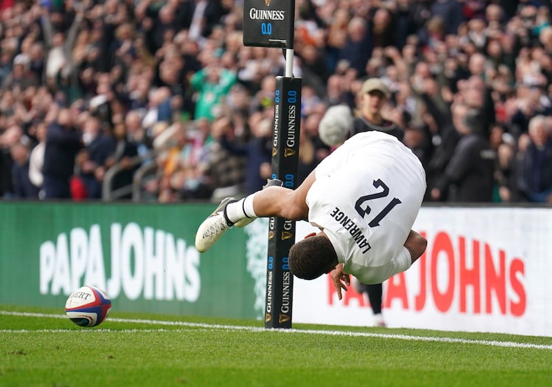 Ollie Lawrence somersaults over for England’s opening try