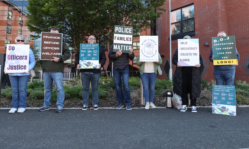 Blue lights protesters outside the policing board office on Thursday.
PICTURE COLM LENAGHAN