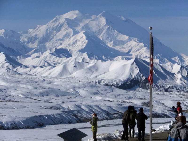 People stand at the Eielson Visitor Centre in Denali National Park and Preserve, Alaska (Becky Bohrer/AP)