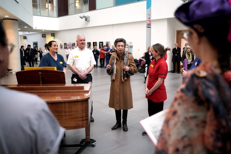 Anne speaks with the choir who performed during her visit