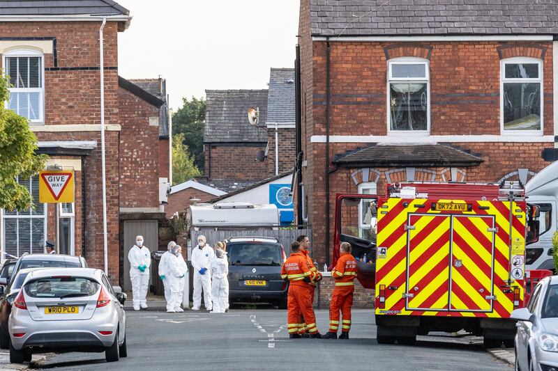 Emergency services near the scene of the knife attack in Hart Street, Southport