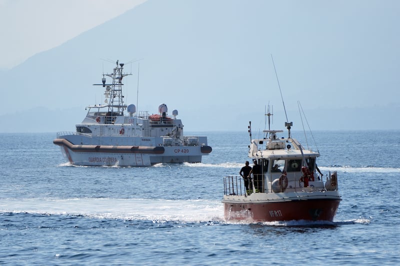 Rescue boats on the water on the fifth day of the search and recovery operation after the yacht sank