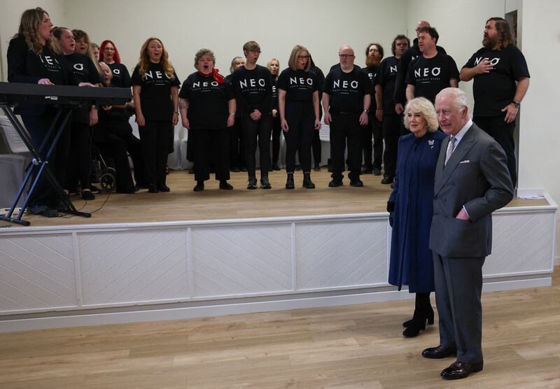 The King and Queen Camilla listen to a choir during a visit to Middlesbrough’s International Centre