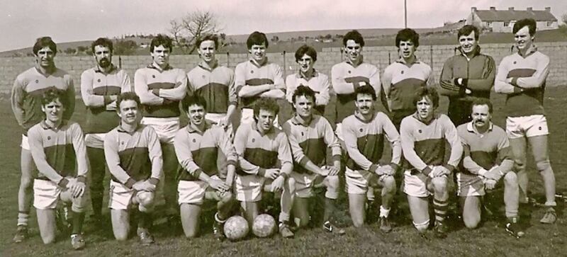 Mark McCartan (back row, far right) beside dad Dan and Greg Blaney ahead of a Carryduff game in 1985. Brendan Guinness (back row, fifth from left), father of current Down players Daniel and James, is standing to the right of John Kelly. Also pictured (front row, third from right) is Kieran Swail, whose son Eamon is on the Carryduff panel 