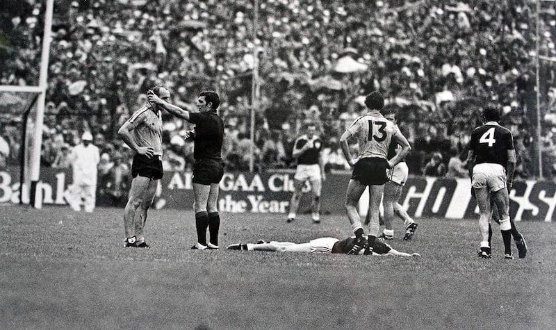 John Gough issues a red card to Dublin midfielder Brian Mullins for levelling Galway's Brian Talty with an elbow. The St Vincent's man was the first of four players to be shown a red card that day 