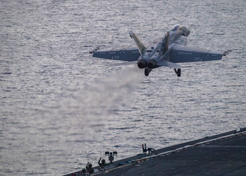 An F/A-18 Super Hornet launches from the flight deck of the aircraft carrier USS Theodore Roosevelt in the South China Sea on July 5 (Seaman Aaron Haro Gonzalez/US Navy/AP)