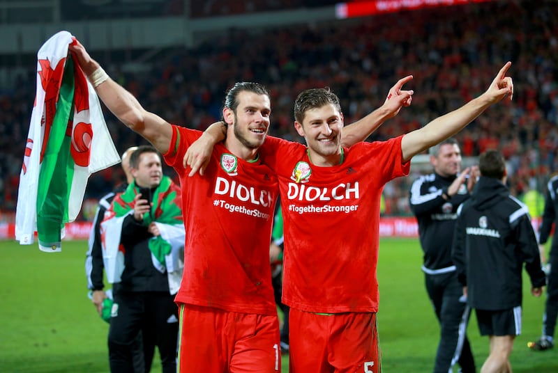 Ben Davies (right) is closing in on 100 Wales caps and the record of his former team-mate Gareth Bale