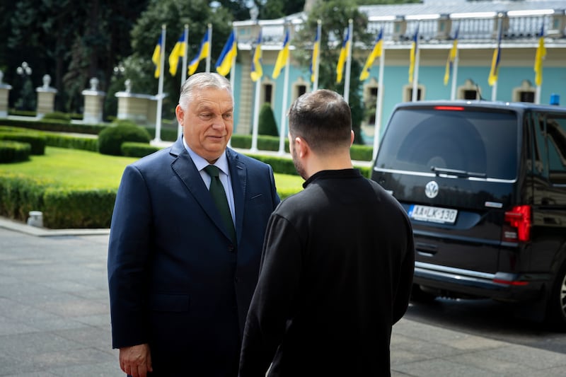 Ukrainian President Volodymyr Zelensky, right, welcomes Hungarian Prime Minister Viktor Orban in Kyiv, Ukraine (Zoltan Fischer/AP)