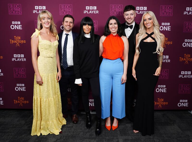 Traitors finalist rankie, Alexander, Charlotte, Jake and Leanne with host Claudia Winkleman