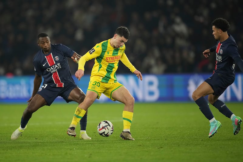 Matthis Abline’s breakaway goal snatched a point for Nantes at Paris St Germain (Christophe Ena/AP)