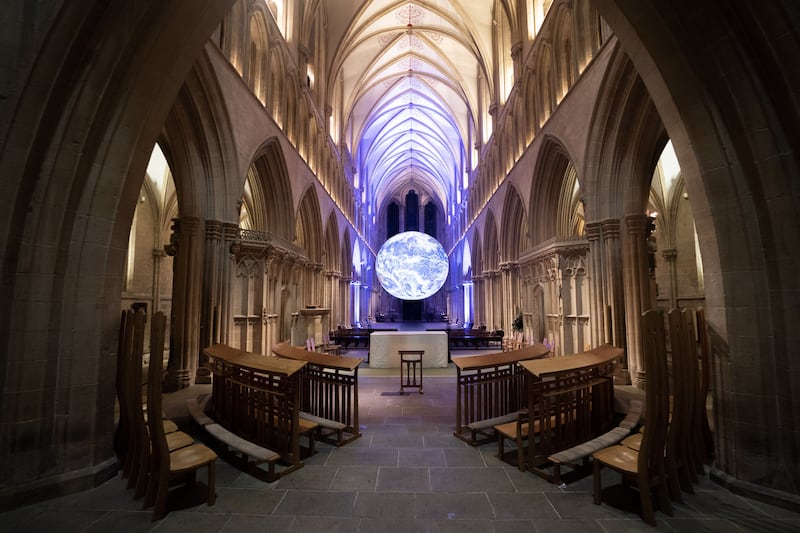 Gaia, Luke Jerram’s seven-metre-wide replica of the earth, created using detailed NASA imagery of the Earth’s surface, pictured suspended in Wells Cathedral, Somerset