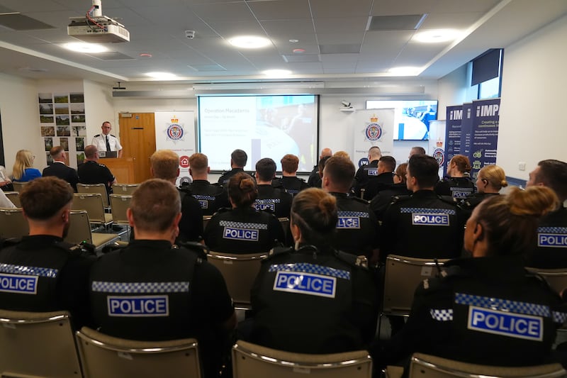 Cleveland Police officers during a briefing ahead of the raids