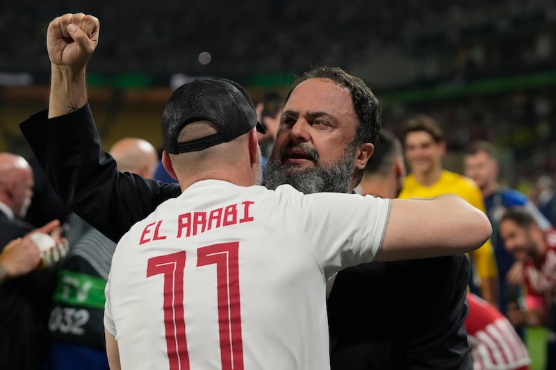 Evangelos Marinakis celebrates at the end of the Conference League final against Fiorentina (Thanassis Stavrakis/AP)