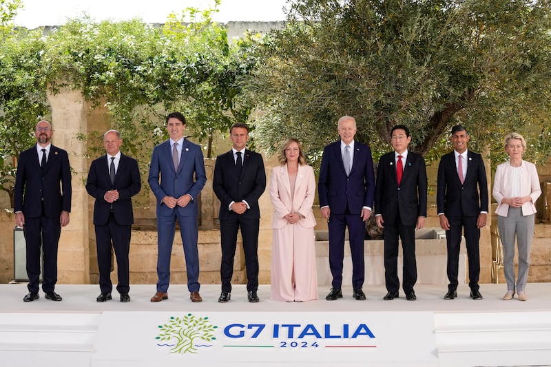 US President Joe Biden, centre right, was attending the G7 summit in Borgo Egnazia, Italy (Alex Brandon/AP)