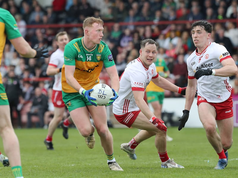 Oisin Gallen with Kieran McGeary and Conal Devlin of Tyrone during the Ulster Senior Football Championship semi final match played at Celtic Park, Derry on Sunday 28th April 2024