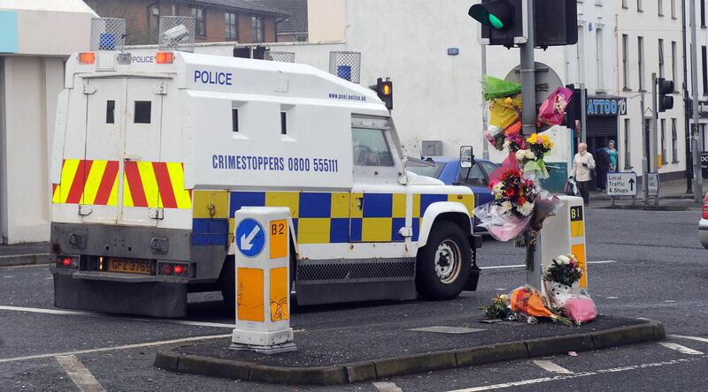 PACEMAKER BELFAST  11/02/2013
Flowers left at the scene following the  death of PSNI officer Phillippa Reynonds, who died when the police car she was a rear seat passenger in was hit by a stolen vehicle in Derry on saturday ,  Shane Christopher Frane, 25, and Conor Tyrone Clarence, 23 appeared at court on monday in relation to the death 
Photo Colm Lenaghan/Pacemaker