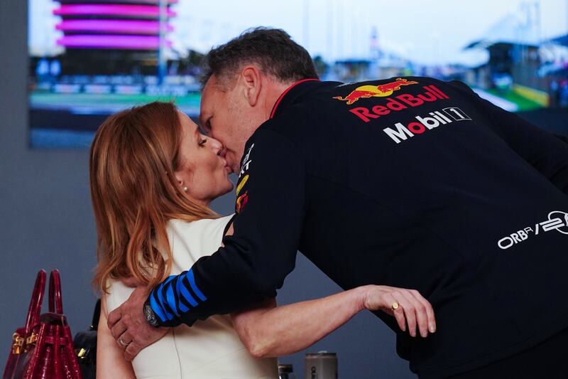 Christian and Geri Horner kiss before the Bahrain Grand Prix.