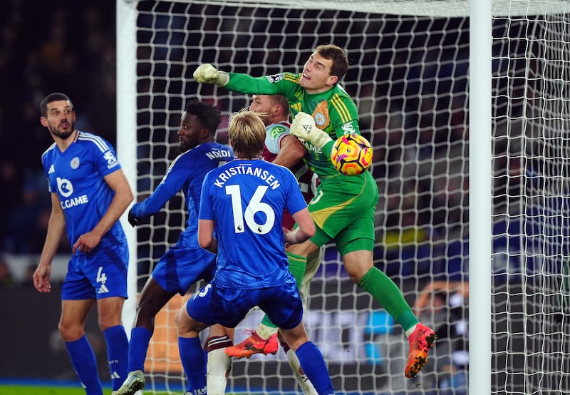 A foul is given against Tomas Soucek as Leicester goalkeeper Mads Hermansen punches into his own goal