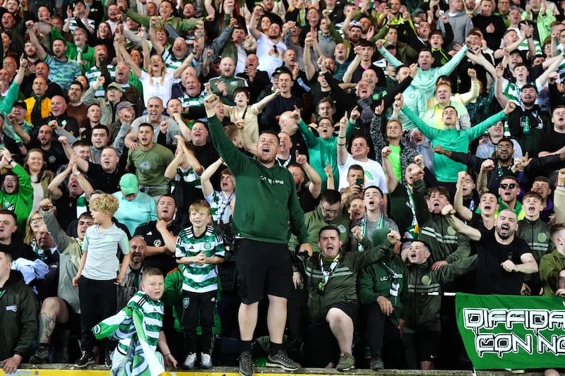 Celtic fans celebrate in the stands