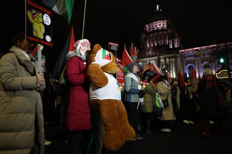 Pro-Palestine protesters march from City hall to the BBC in Belfast on Friday evening.
PICTURE COLM LENAGHAN