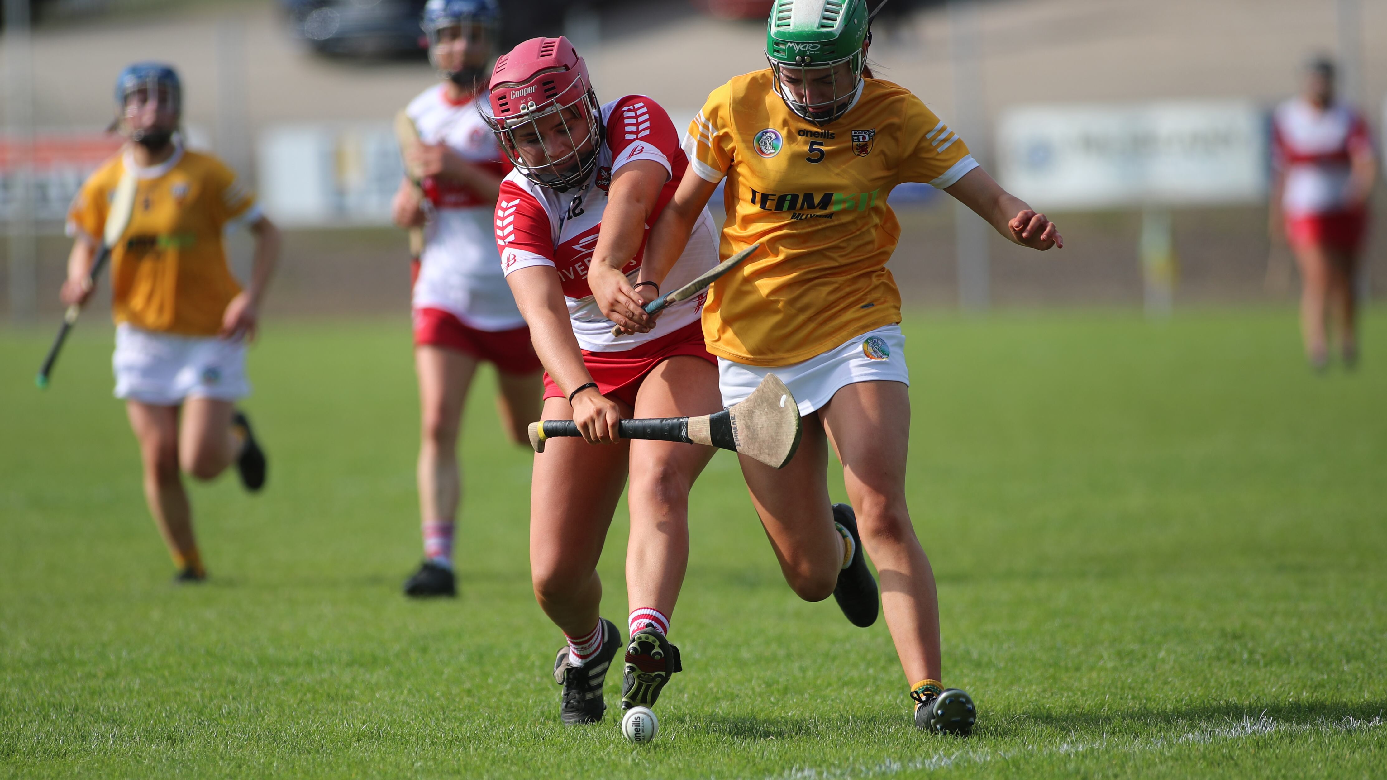 Antrim's Erin Coulter and Eimhear McGuigan of Derry