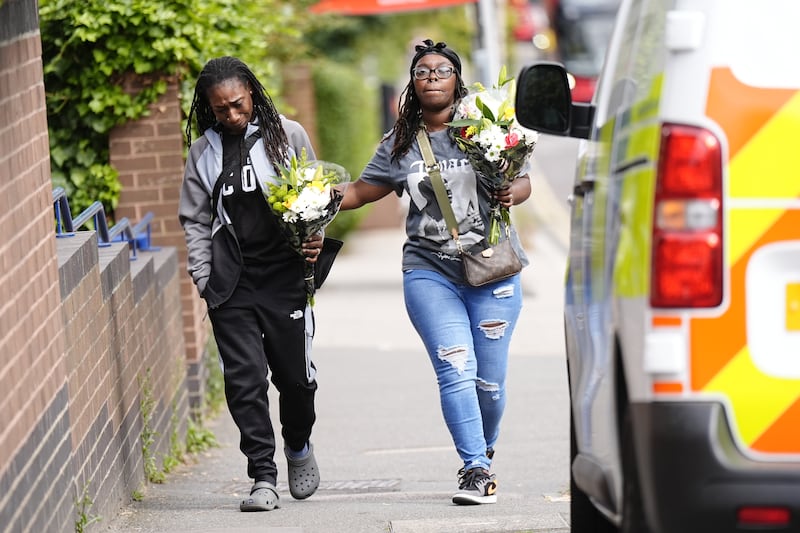 Members of the public arrived at the scene with floral tributes