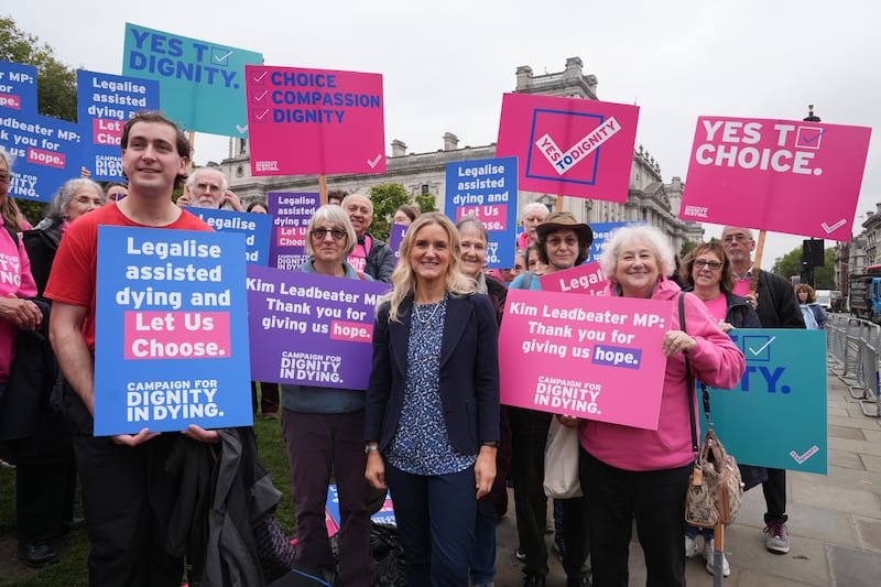 Labour MP Kim Leadbeater (centre) joins as Dignity in Dying campaigners gather in Parliament Square, central London, in support of the assisted dying Bill