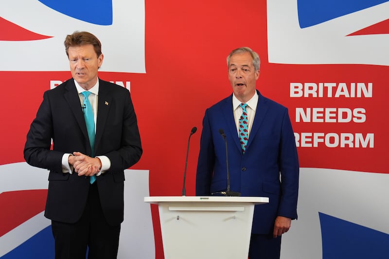 Leader of Reform UK Nigel Farage (right) and Richard Tice announce their party’s economic policy