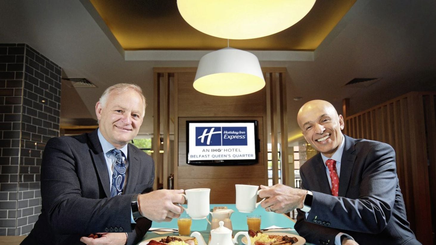 Andras Hotels director Rajesh Rana (right) with Danske Bank&#39;s Lewis McCallan 