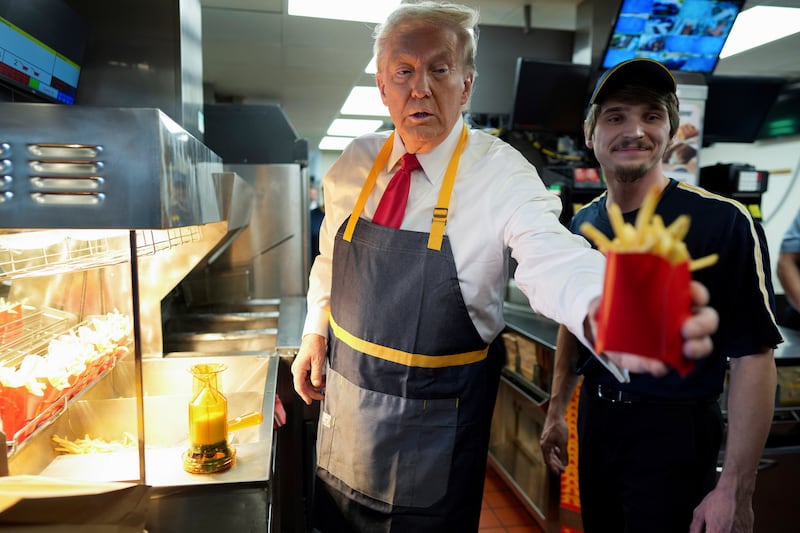 Donald Trump hands out fries (Doug Mills/The New York Times/AP/Pool)