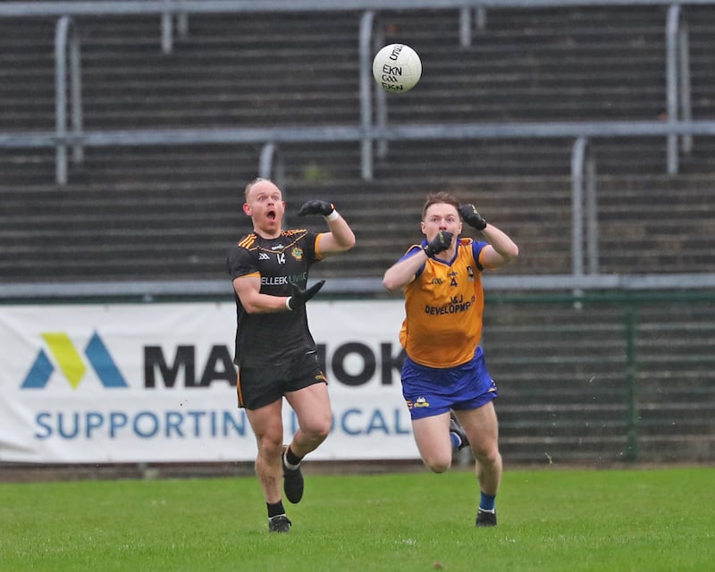 Shane Rooney and Josh Horan race to meet the dropping ball at Brewster Park during the Fermanagh SFC final draw between Erne Gaels and Enniskillen Gaels