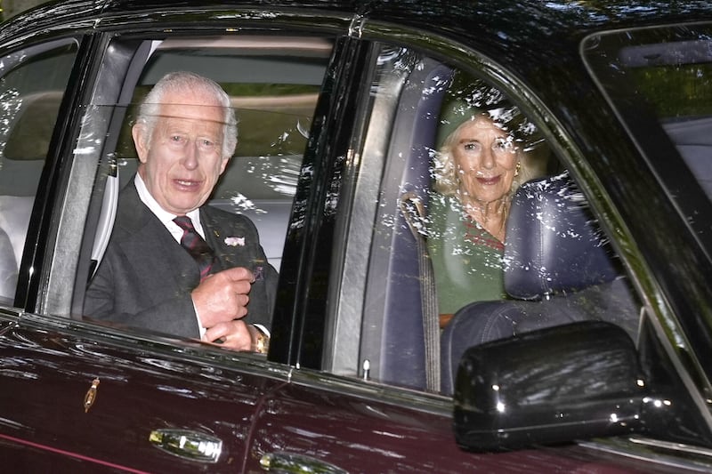 The King and Queen sat next to one another as they arrive at the church