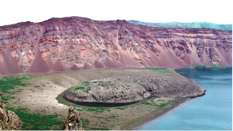 The mystery eruption occurred at Zavaritskii volcano (Simushir Island, Kurils). The explosion generated a 3km wide caldera revealing spectacular red, black and white layers made up of past eruptive deposits.