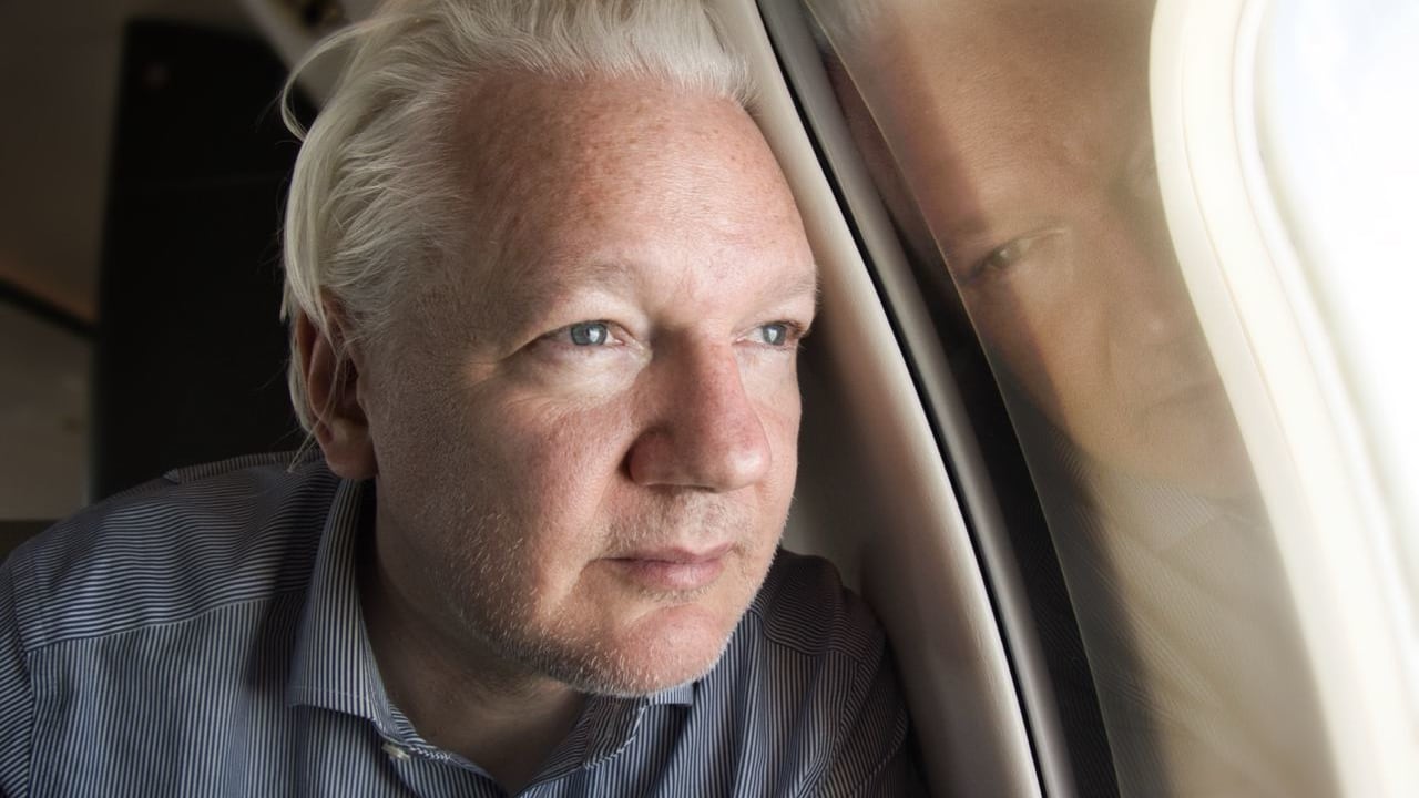 WikiLeaks founder Julian Assange, centre, arrives at the United States courthouse in Saipan, Mariana Islands, Wednesday, June 26, 2024. (AP Photo/Eugene Hoshiko)