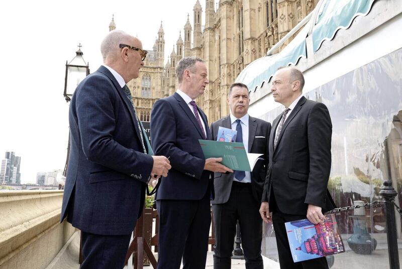 L-R: Trade NI&#39;s Colin Neill (Hospitality Ulster), Stephen Kelly (Manufacturing NI) and Glyn Roberts (Retail NI), engage NI Secretary of State Chris Heaton-Harris at Westminster in May. 