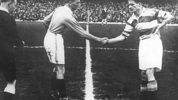 BIG TWO: Belfast Celtic captain Jimmy McAlinden (right) takes the toss with his Linfield counterpart prior to the 1944 Irish Cup final at Windsor Park. Celtic won the game 3-1, goals coming from McAlinden, Paddy Bonnar and Artie Kelly. The Belfast Celtic team that day was: H Kelly, McMillen, Cullen, Walker, Vernon, O'Connor, Collins, McAlinden, Byrne, A Kelly, Bonnar&nbsp;