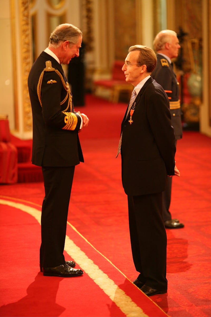 Terry Griffiths is made an OBE by the then-Prince of Wales at Buckingham Palace